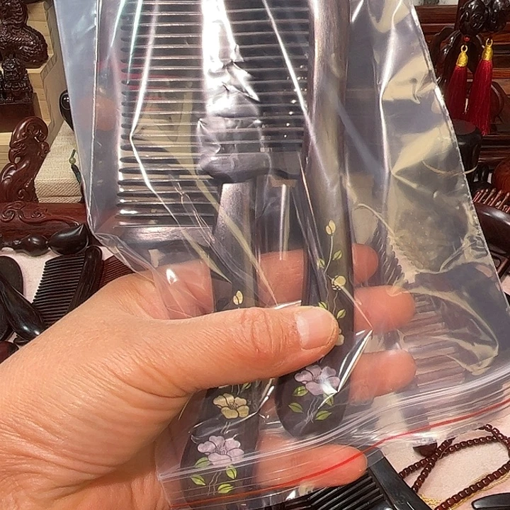 红酸枝木类乌木插齿梳子