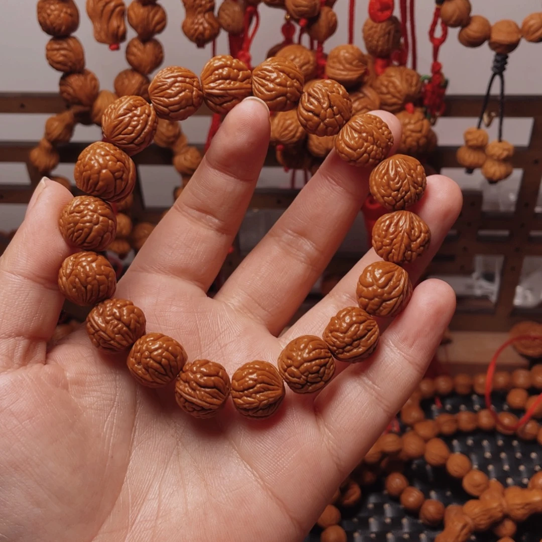 木质类龙纹桃枭手串