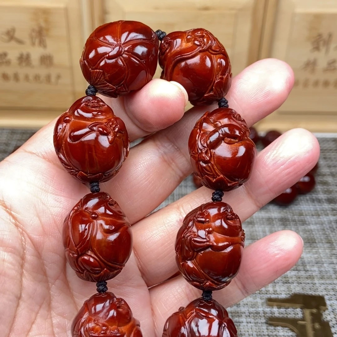 晓***峰橄榄核吊坠米勒24