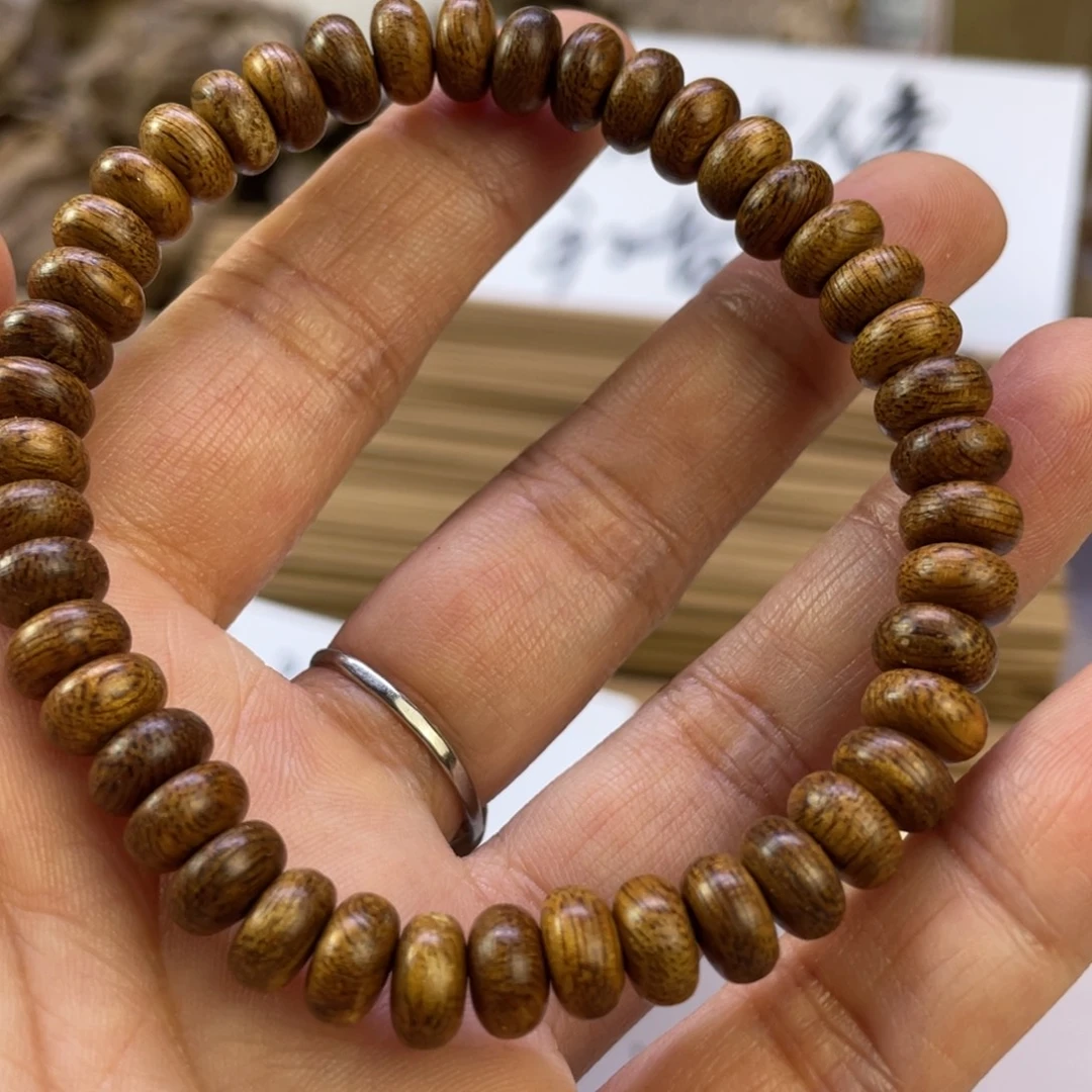 沉香沉香碎屑索隆红T千年碳化算盘珠一条碎料