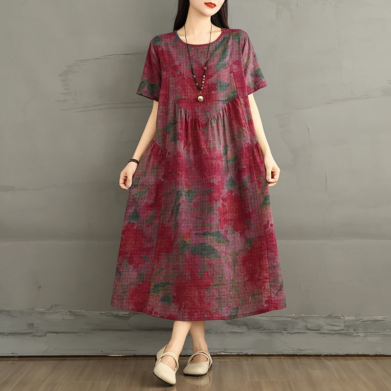 2025夏季新款复古圆领中长款印花短袖连衣裙女宽松显瘦A字裙