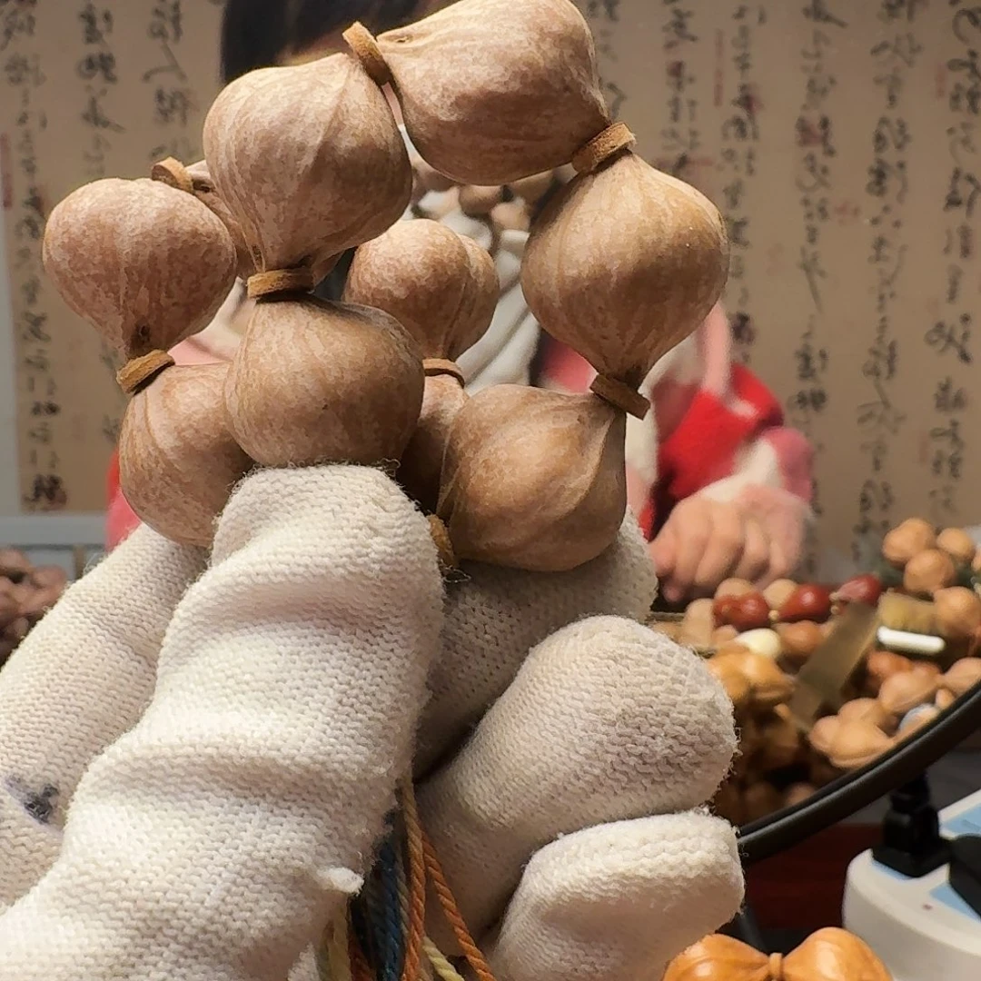 橄榄核把件三面佛