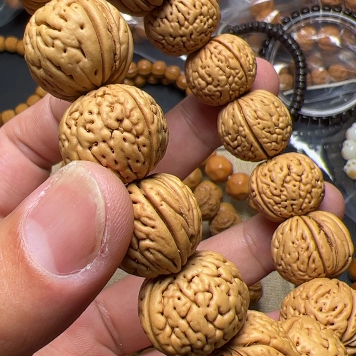 猴头核桃手串遇****）快快乐乐