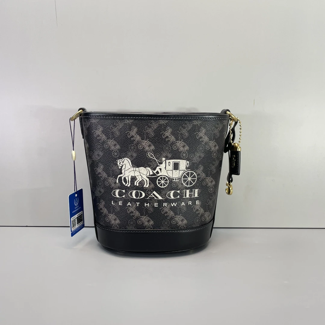 95新 COACH/蔻驰 小林dakotah黑色马车水桶包16*18*10cmSB030703