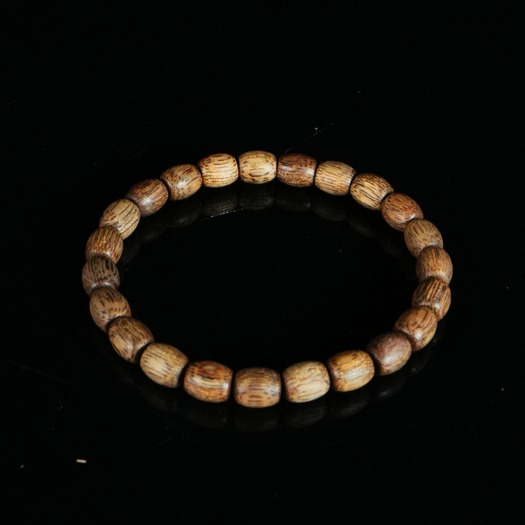 DY-A9972 马来粗纹沉香老型珠手串 0.72x0.83cm 3.62g