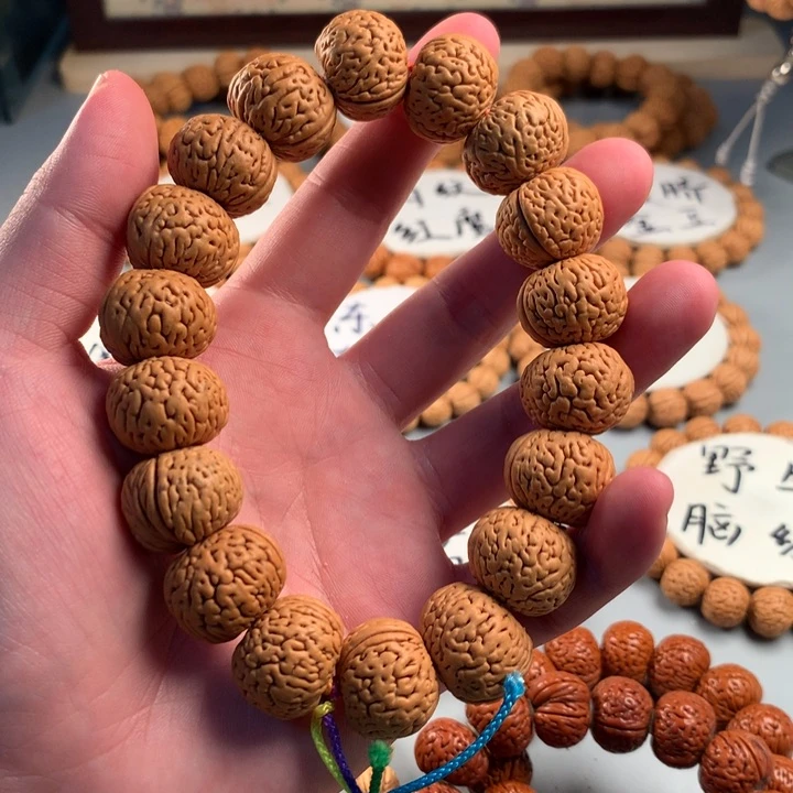 苏****桃核吊坠磨盘磨盘