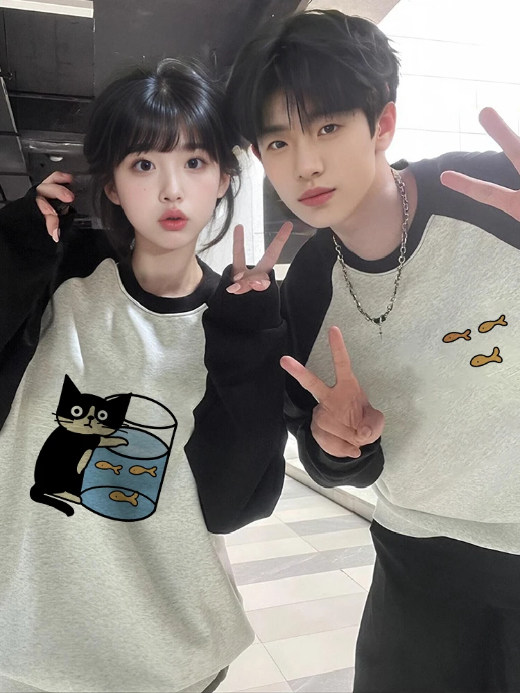 2025秋季插肩袖情侣卫衣一男一女秋冬大码加绒保暖卡通圆领外套潮