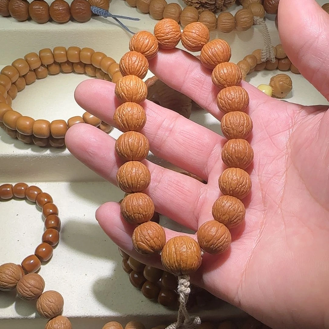 猴头核桃手串（****溪原皮无修凤羽