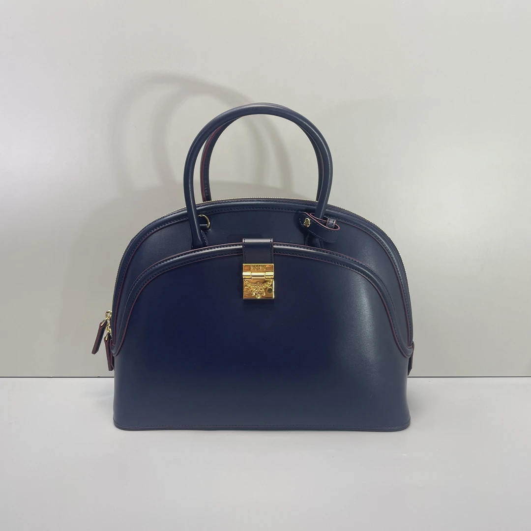 99新 MCM 媚姐/mcm蓝色大号贝壳包33x25x11cmG010609