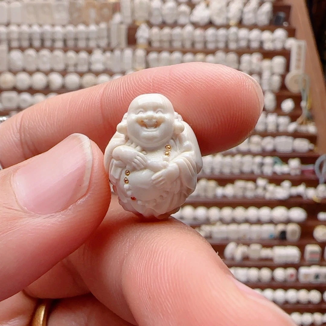 冷***人其他猛犸象牙八宝弥勒凤凰款