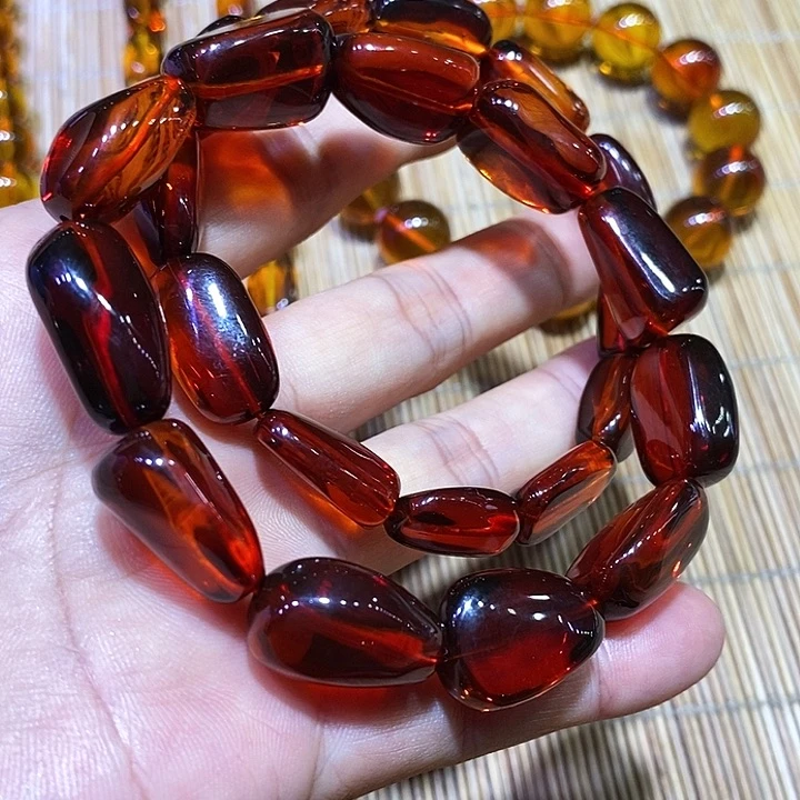 未镶嵌颈饰琥珀婺**象血珀酒红玻璃底手串30克