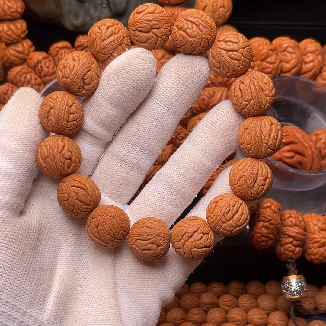 手串桃核金丝龙珠1.6