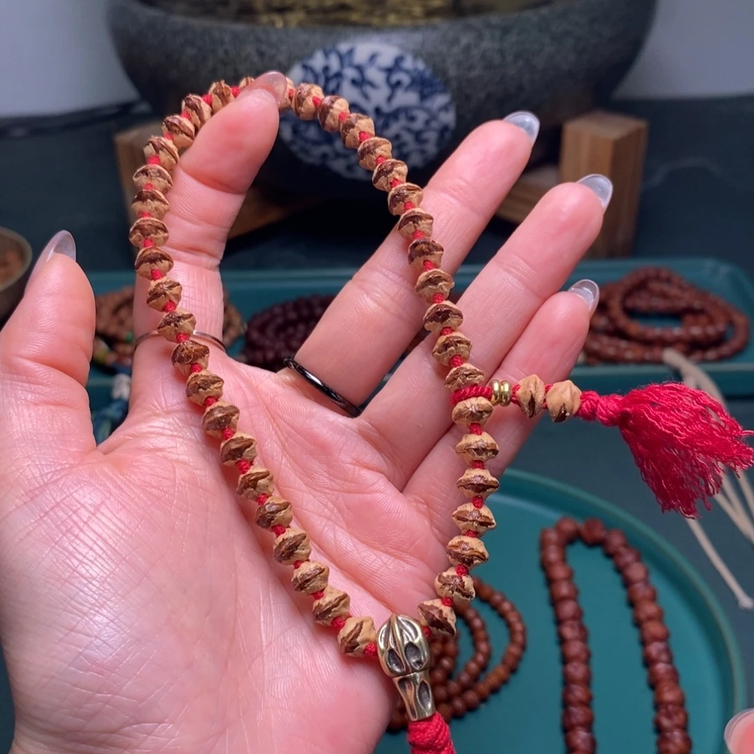 吊坠柏香籽/百香籽146红牙