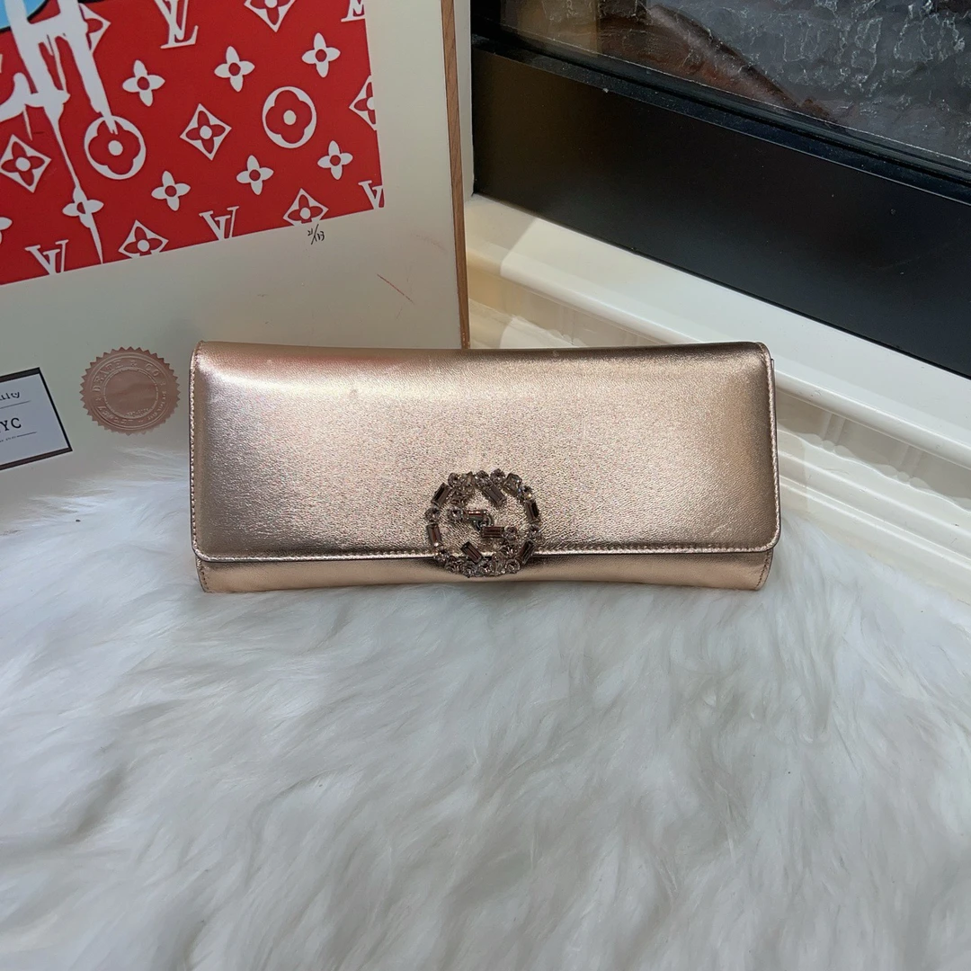 95新 GUCCI/古驰 GUCCI古驰钻口手拿包 a6086