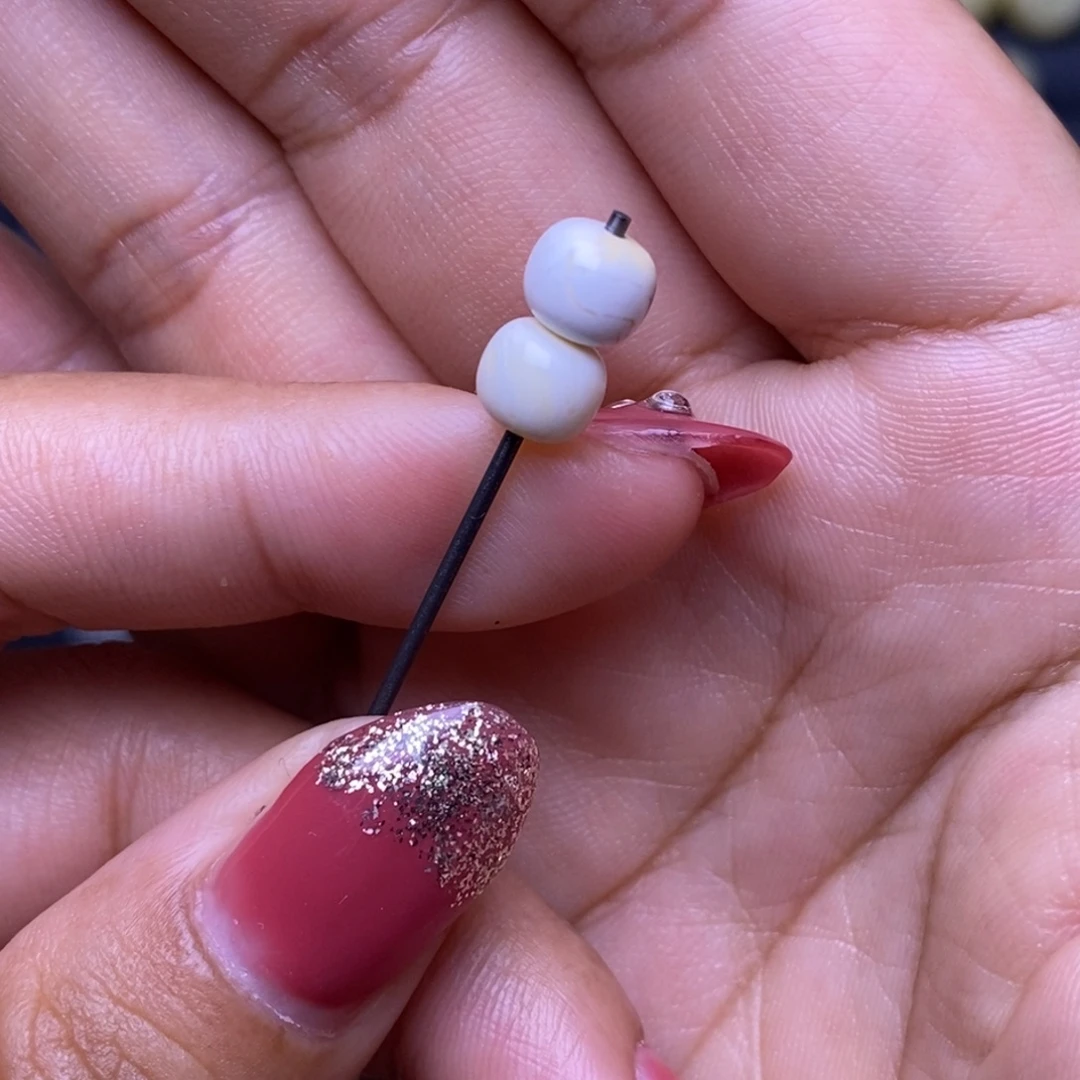 琥珀未镶嵌裸石瓷白妖花老型6.9*8.8mm
