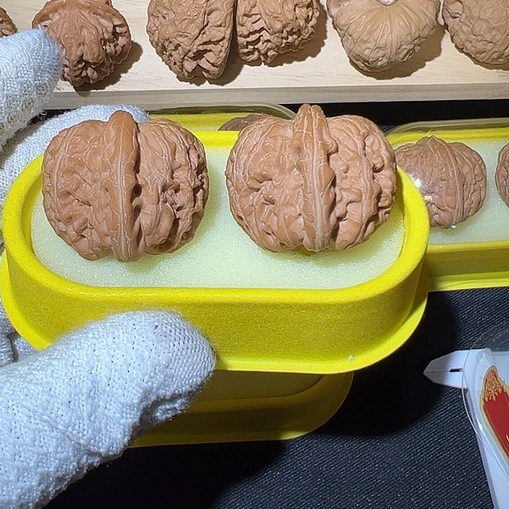 丶***文玩核桃吊坠毕业元宝