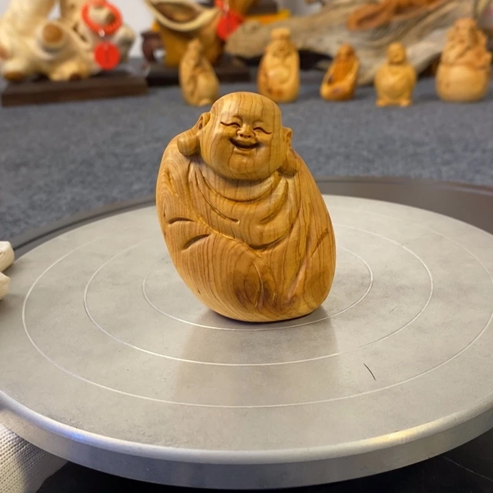 柏木（崖柏）弥勒佛手把件