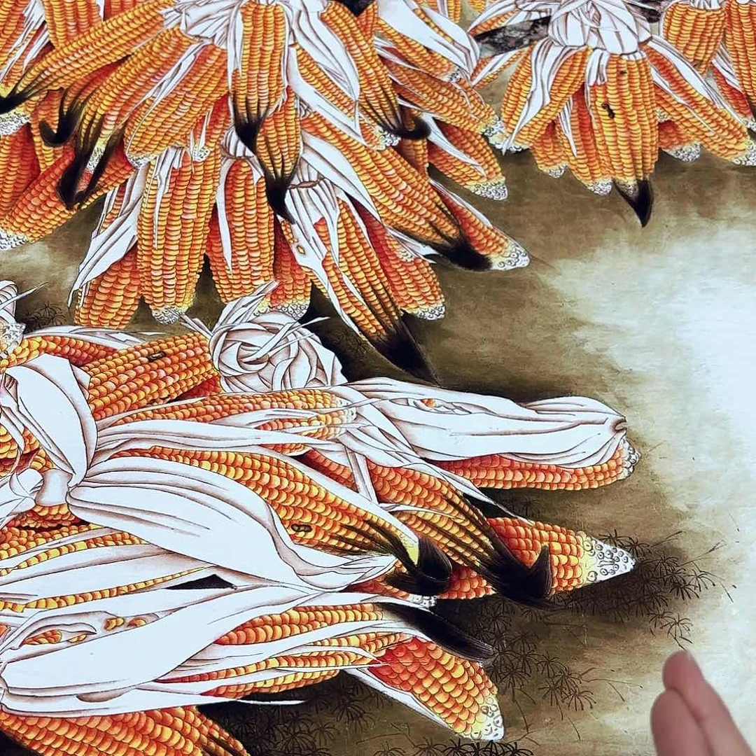 一个钢镚换字画年画