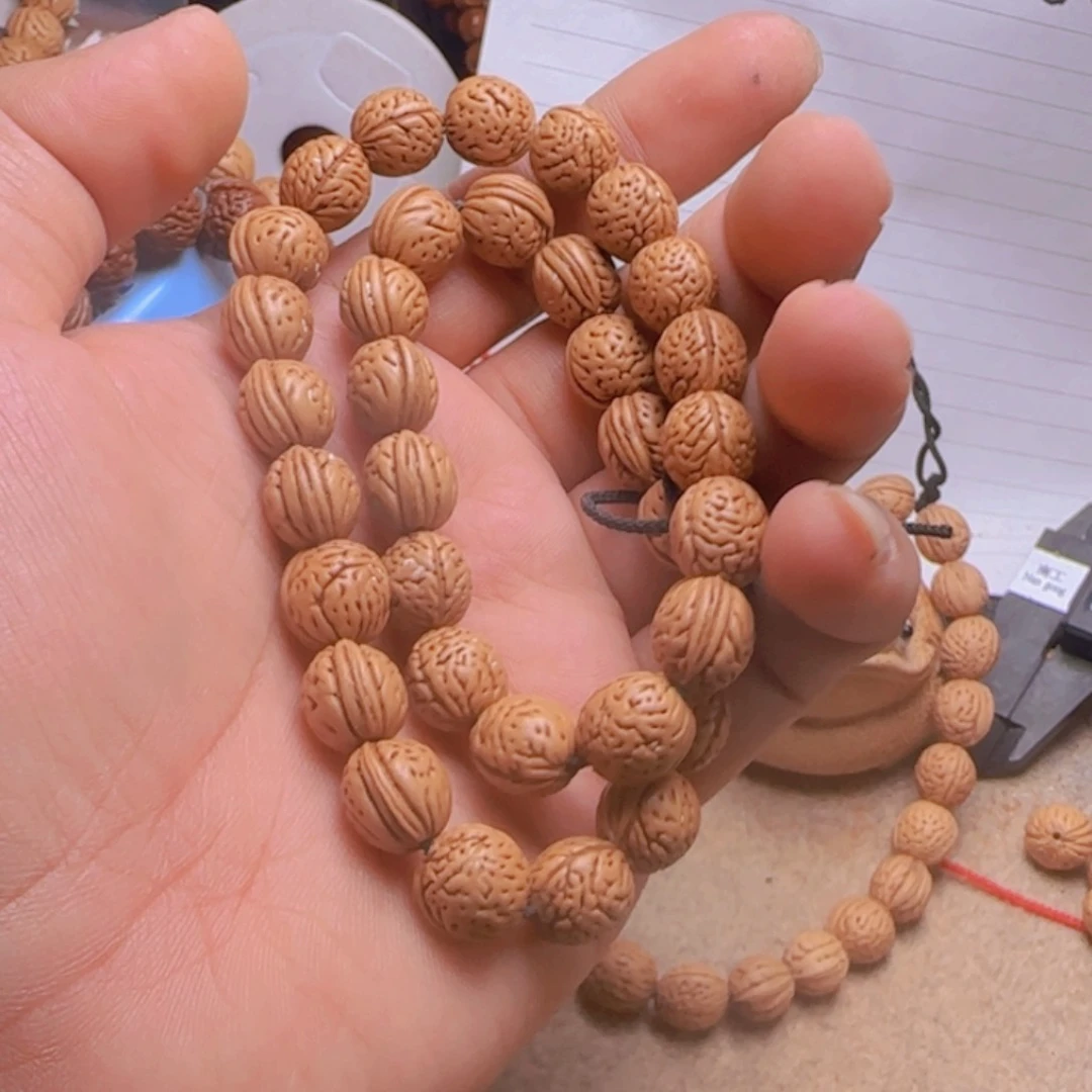 拍90野生桃核蚂蚁纹手持一条