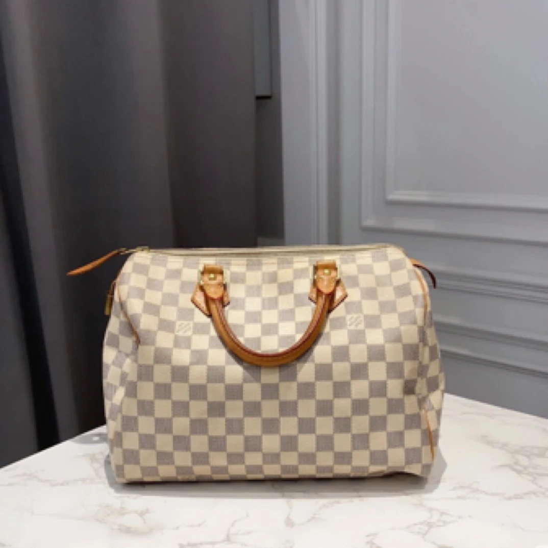 95新 LouisVuitton/路易威登 speedy30白色pvc手提包/87185