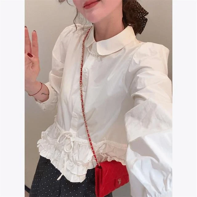 娃娃领下摆拼接花边系带白色衬衫女春季2025新款爆款衬衣女款上衣