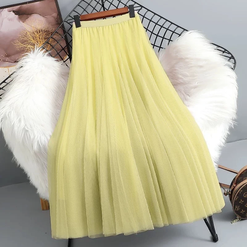 网纱半身裙女2025新款纱裙720度大摆A字长裙演出新疆舞奶油黄纱裙