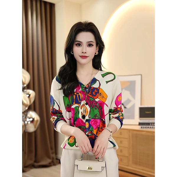 早春时尚设计感百搭显瘦气质织花休闲复古宽松洋气外搭针织开衫女