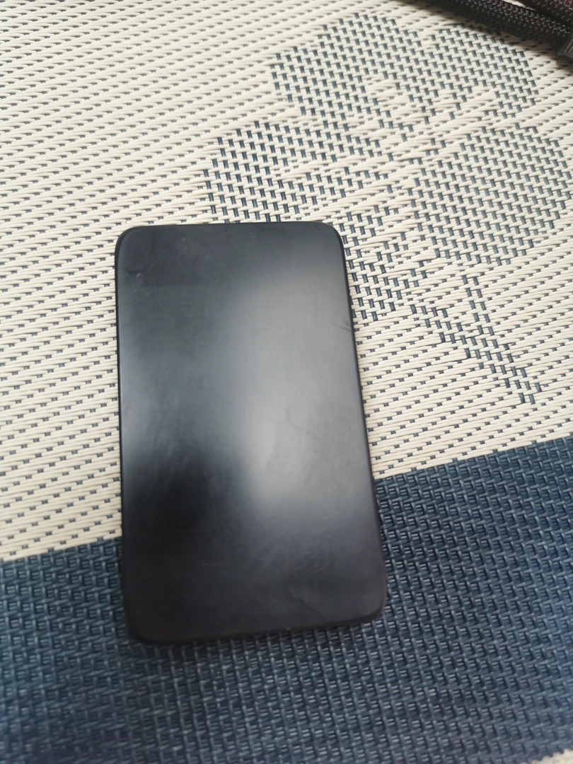 新疆和田玉墨玉小47钢板细料包容