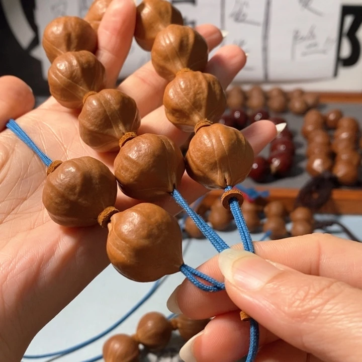 金***M橄榄核手串5222精品老树王百万水晶核9+2颗