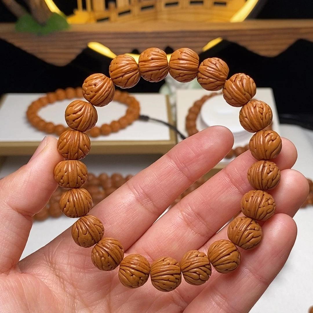 童***忆手串桃核11mm野生金麒麟桃核手串