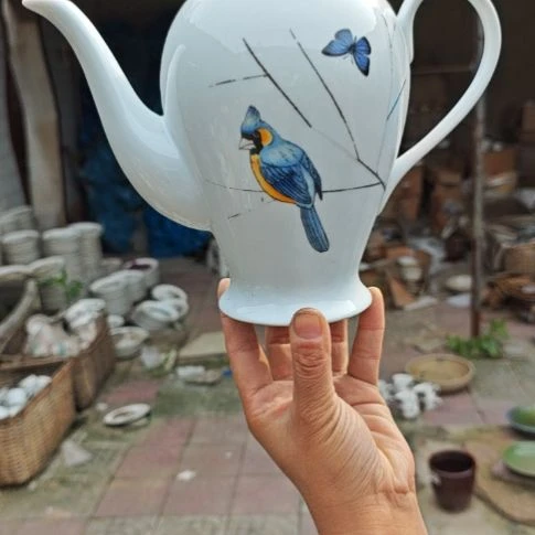 库存瓷片多孔茶壶一个有磕碰