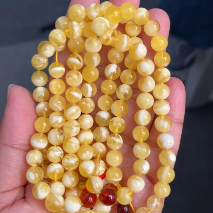 琥珀未镶嵌珠宝奇石M178号7.2+金白妖花