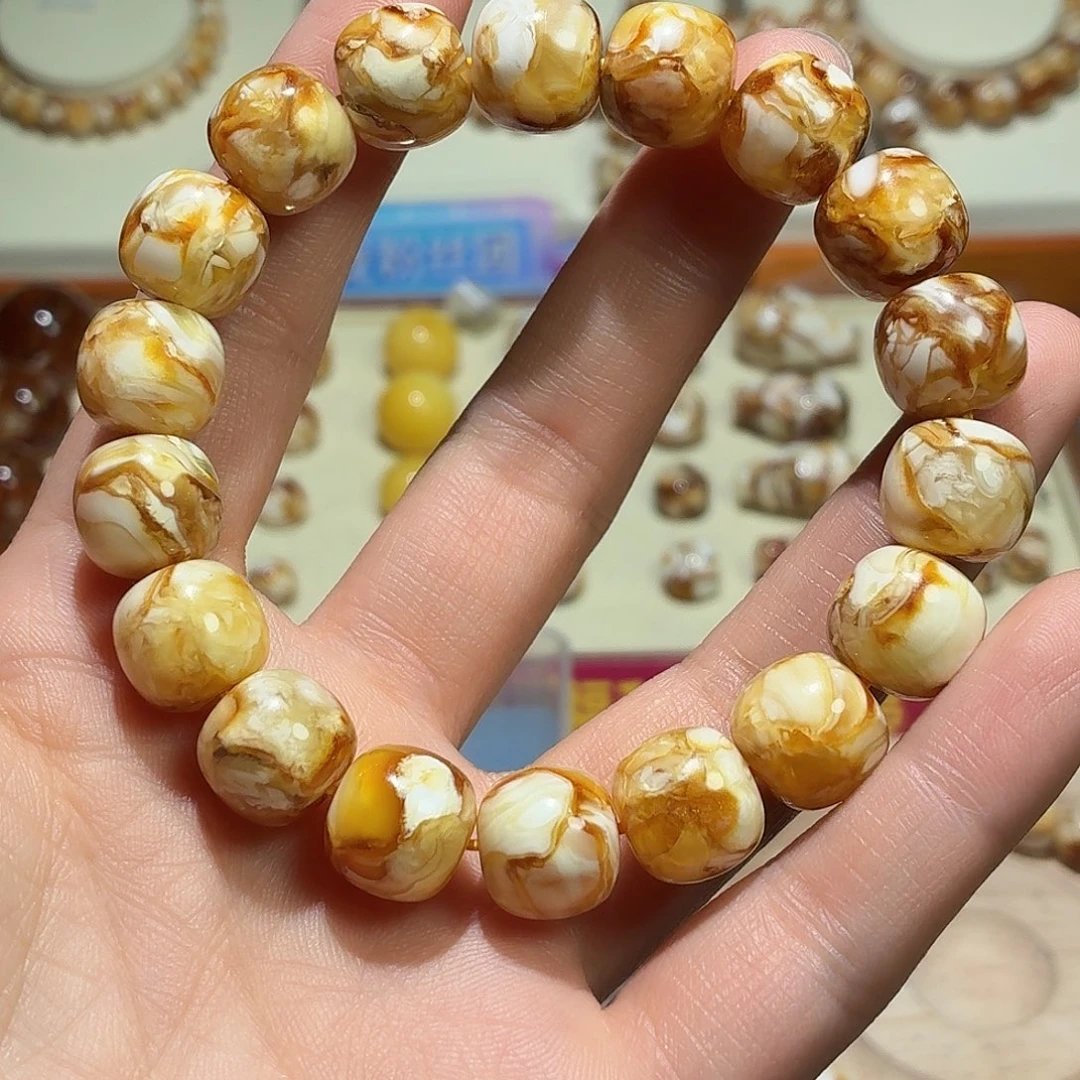 开***传桃核吊坠沁色老型手串