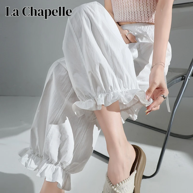 SM外穿秋季新款时尚百搭木耳花边裤脚九分裤宽松显瘦白色休闲裤