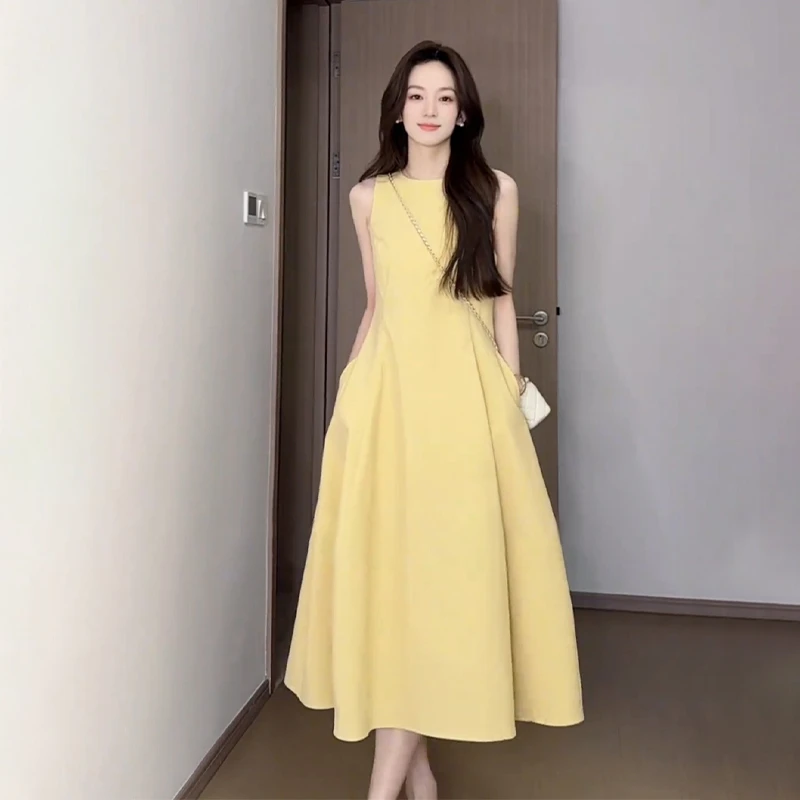 多巴胺无袖背心吊带黄色连衣裙子女夏季2025新款流行爆款掐腰长裙