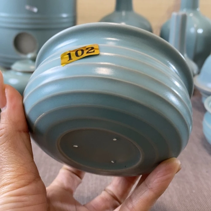 瓷片钱袋杯一一一一一一一暇