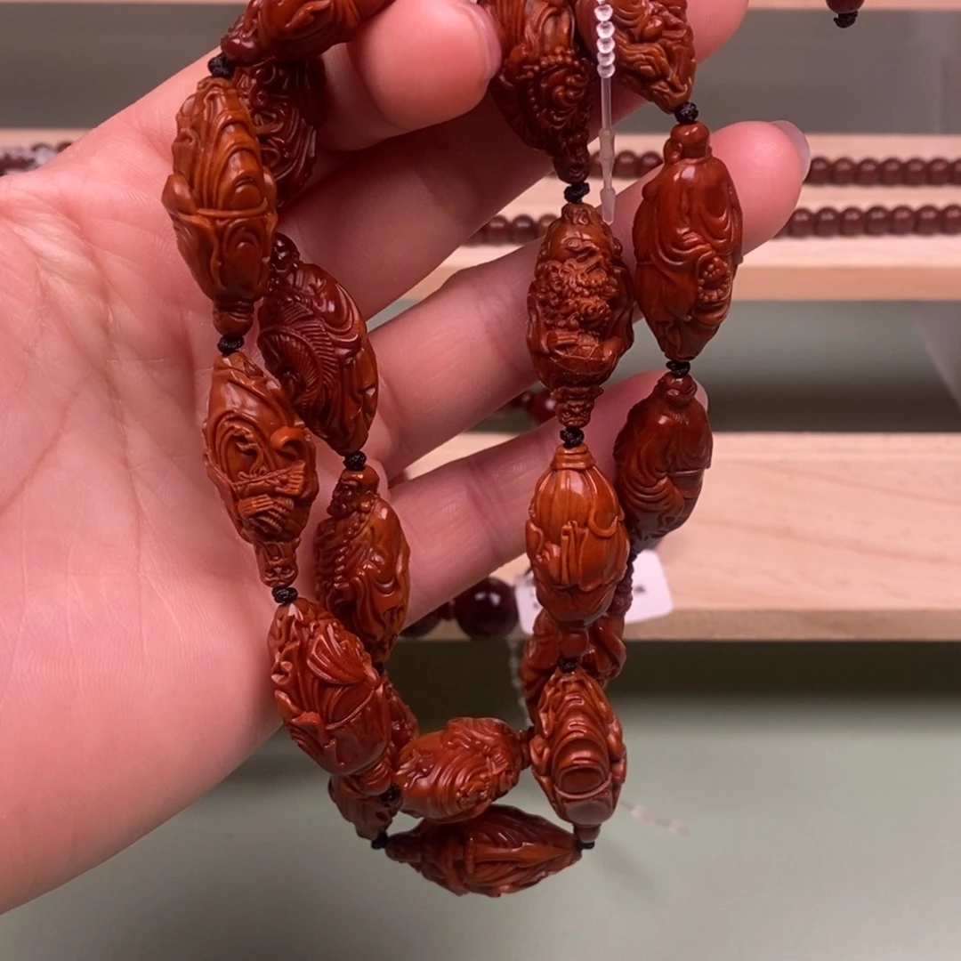 渡***魔大叶紫檀（黑酸枝木类）橄榄核回血直播间