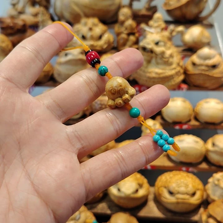 竹竹根雕猫爪手机挂件