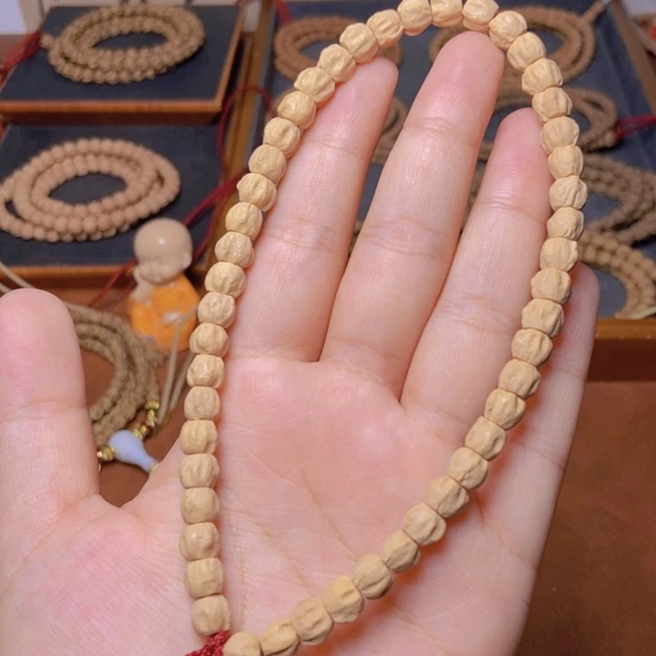 柏香籽/百香籽吊坠手持