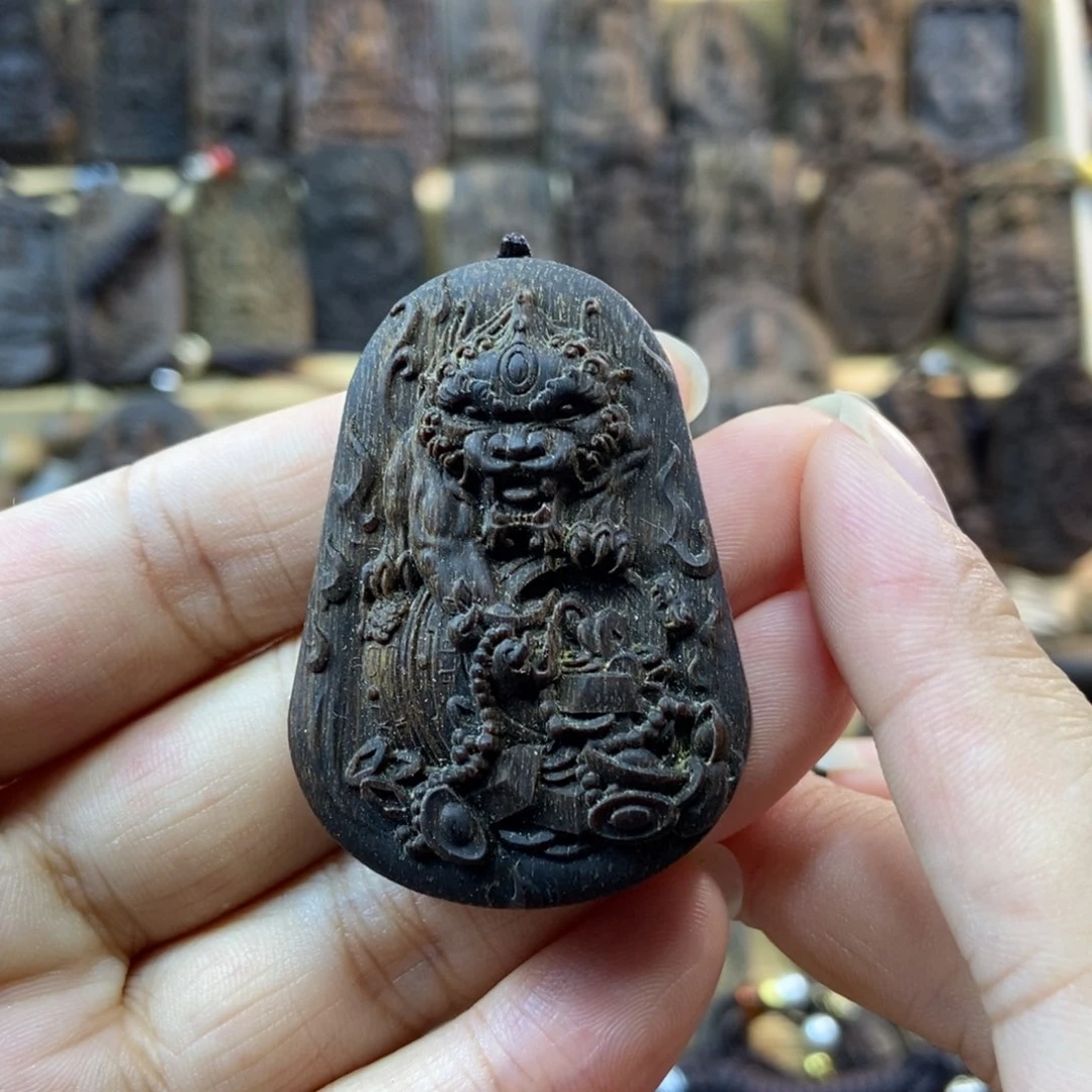 木海**江越南富森红土吊坠