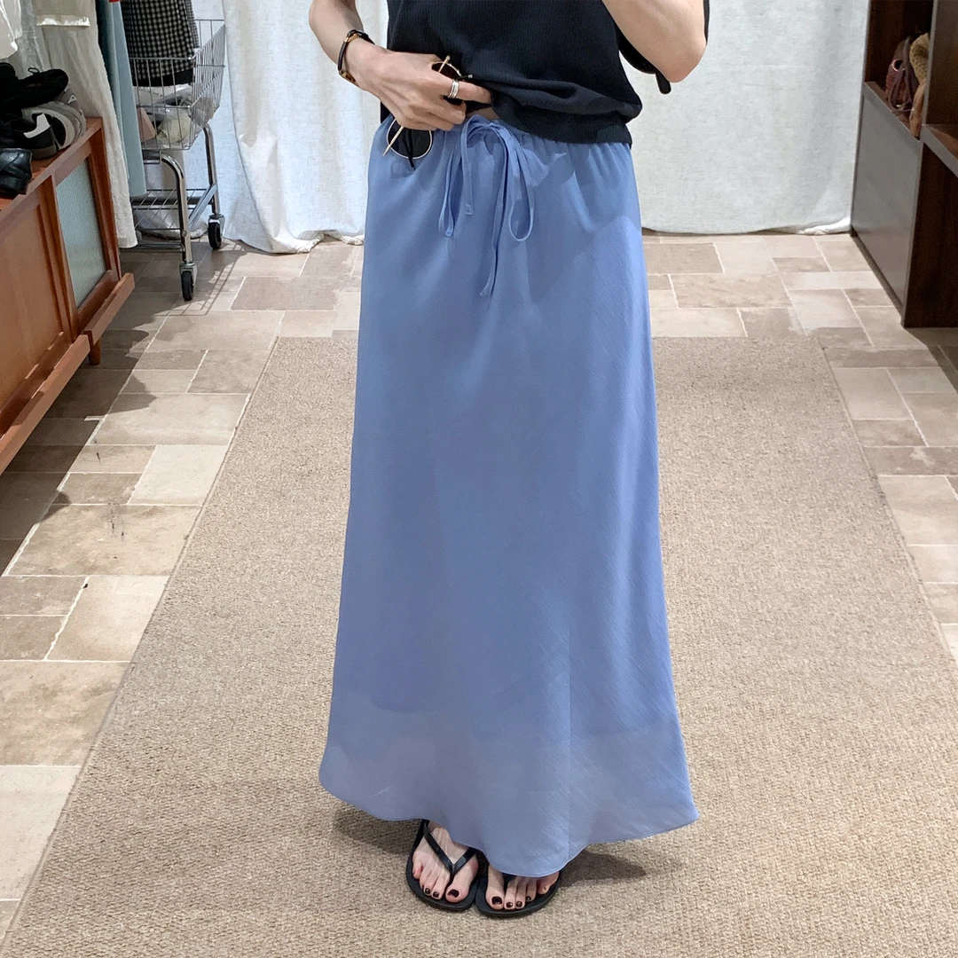 米白色高腰系带半身裙女2025夏新松紧腰设计感显高中长裙