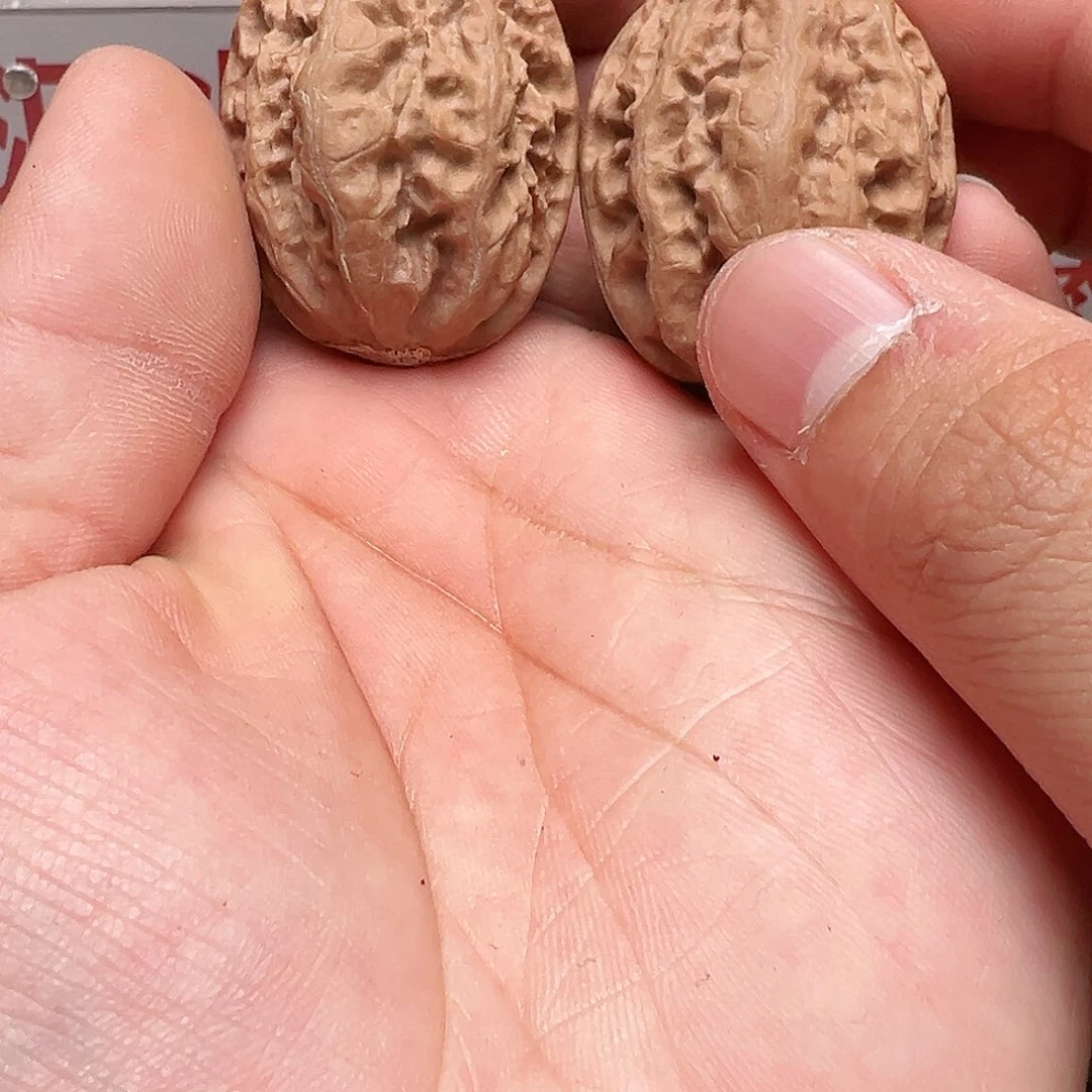 故***纵吊坠文玩核桃秘密