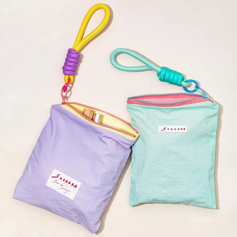 化妆包便携外出薄款马卡龙撞色口红化妆品收纳袋高颜值简约拉链包