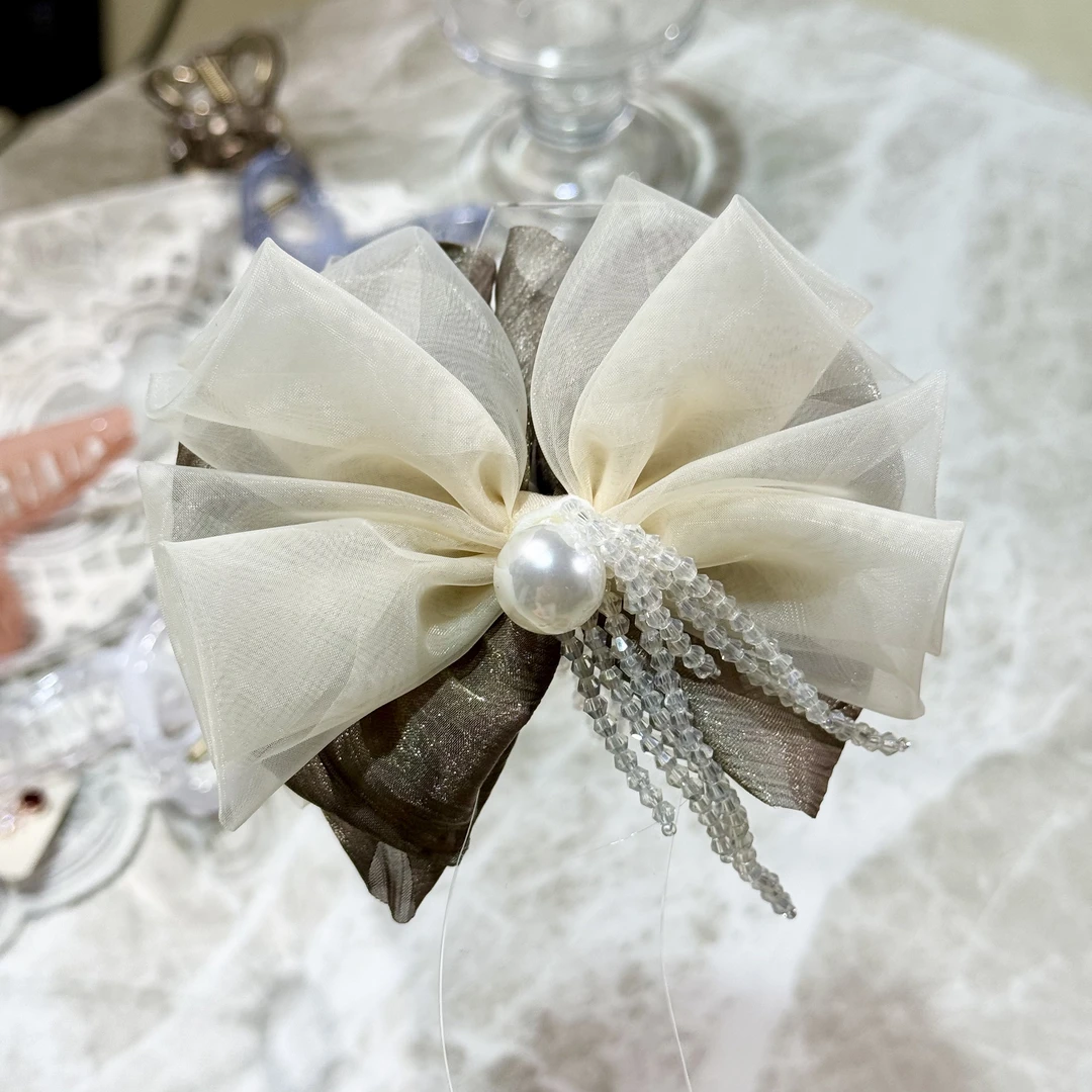 韩国东大门新款发夹仙气珍珠串珠流苏蝴蝶结香蕉夹2031