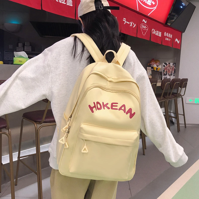女大学生时尚简约书包日系初中高中生百搭上课双肩包韩版旅行背包