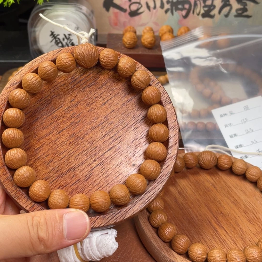 ****。手串猴头核桃凤羽