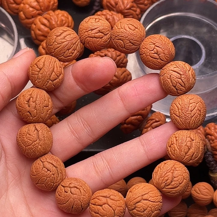 手串桃核金丝龙珠1.6