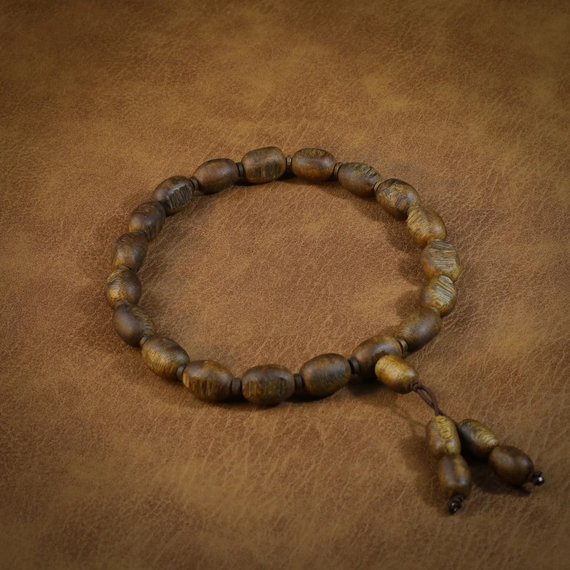 乌身圆叶海南奇楠沉香手持手串随形23g+（随形多样性发一）025077