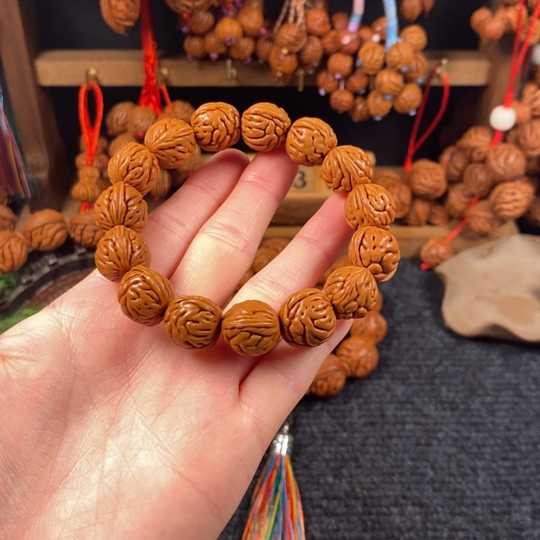 吊坠桃核桃枭手串