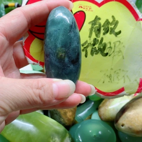 未镶嵌蛇纹石玉手把件